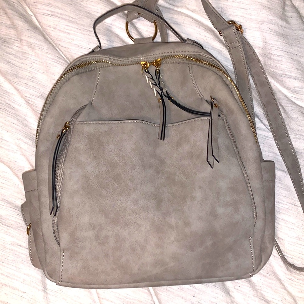 Back pack- 9 pockets! 4 with zippers